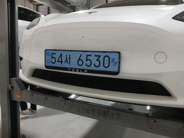 Tesla Model Y 2024 — inspection photo 1