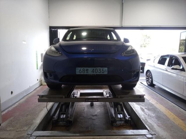 Tesla Model Y 2024 — inspection photo 1