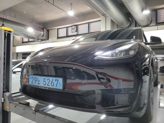 Tesla Model Y 2024 — inspection photo 1