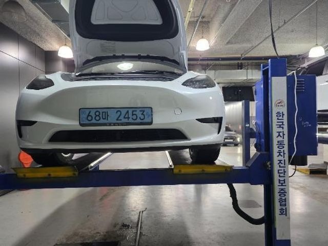 Tesla Model Y 2024 — inspection photo 1