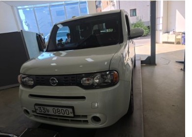 Nissan Cube 2011 — inspection photo 1