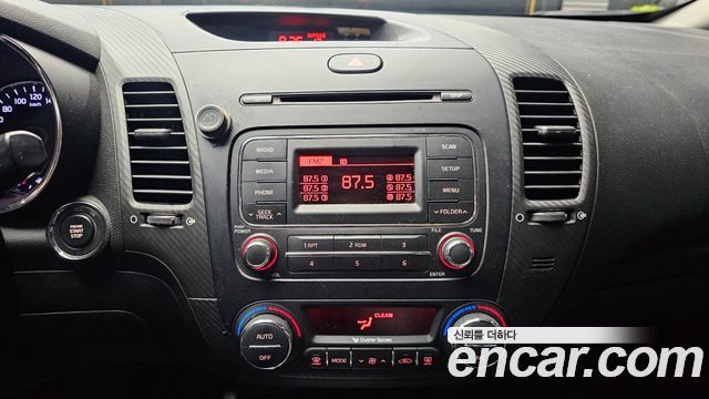 Kia K3 2014 — photo 14
