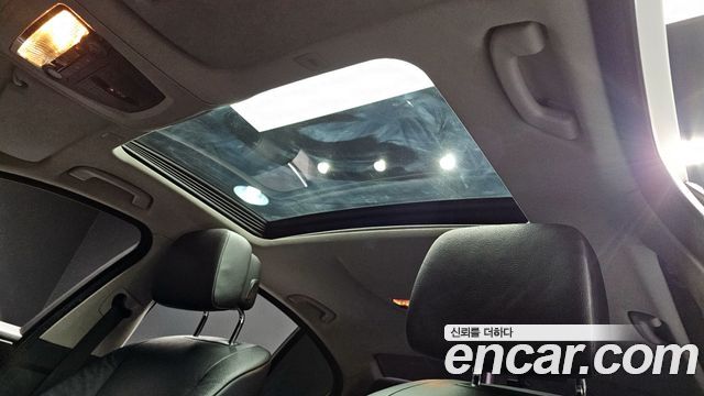 BMW 5-Series 2011 — photo 18