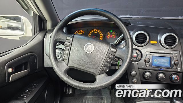 KG Mobility Actyon 2010 — photo 13