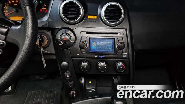 KG Mobility Actyon 2010 — photo 14