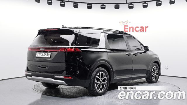 Kia Canival 2023 — photo 2