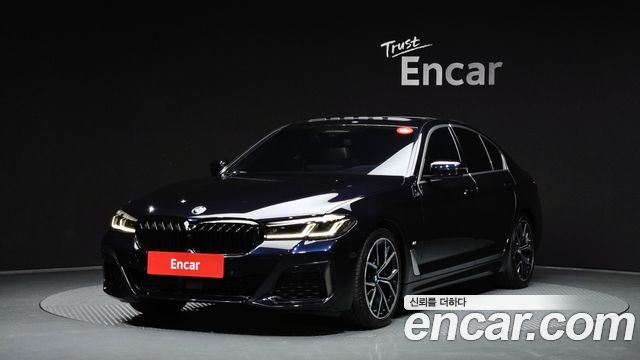 BMW 5-Series 2021 — photo 1
