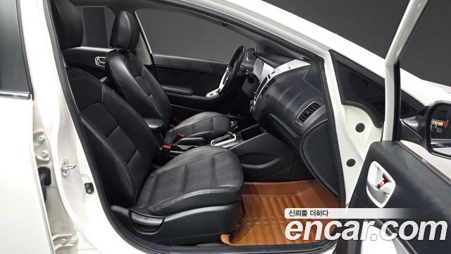 Kia K3 2014 — photo 10