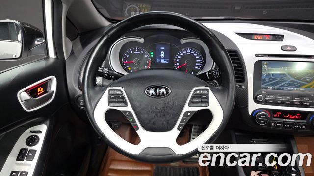 Kia K3 2014 — photo 13