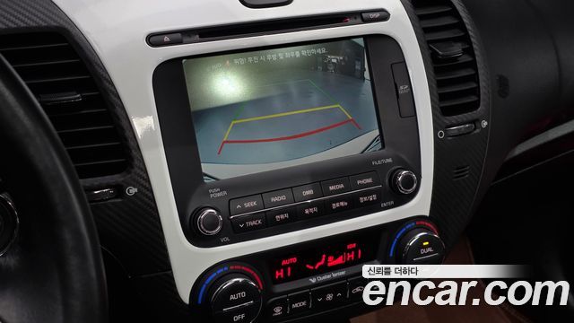 Kia K3 2014 — photo 15