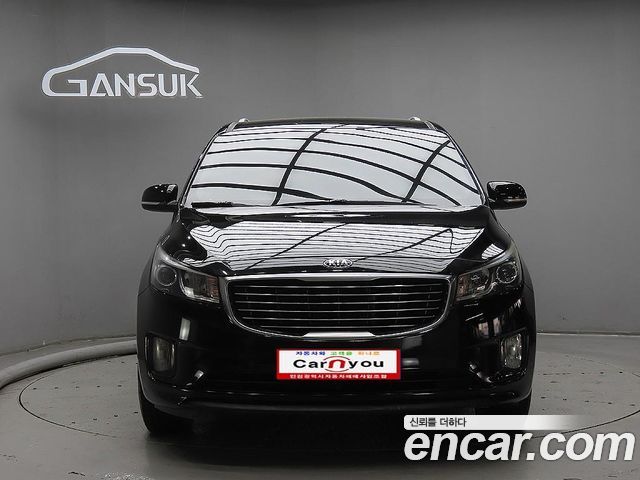 Kia Canival 2015 — photo 1