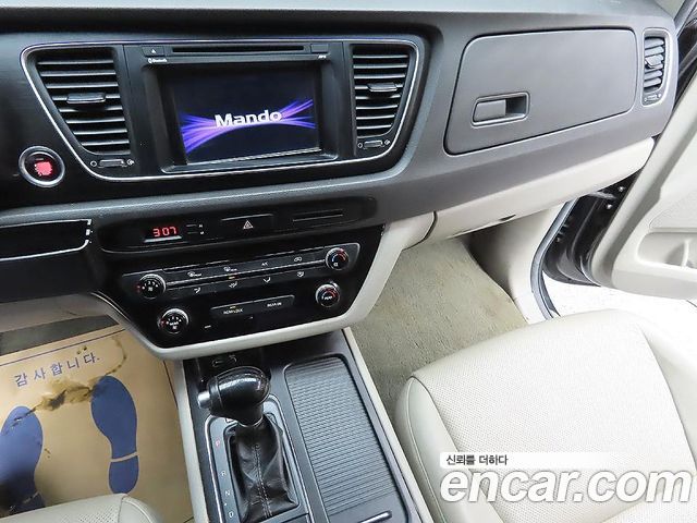 Kia Canival 2015 — photo 12