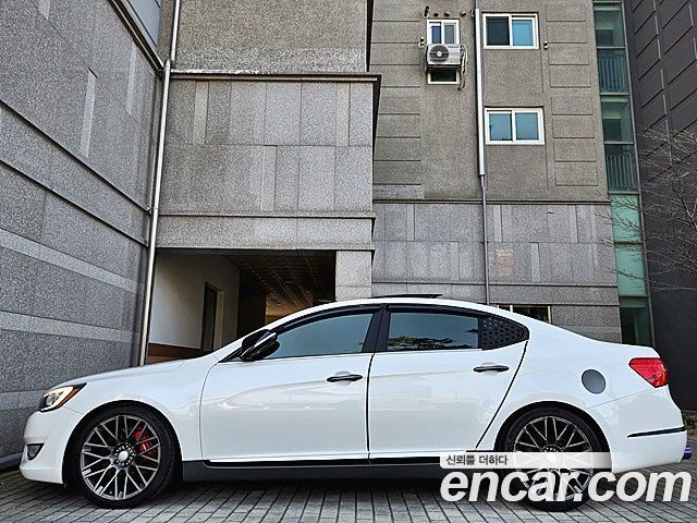 Kia K7 2012 — photo 11