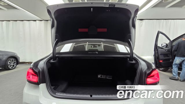 BMW 5-Series 2023 — photo 20