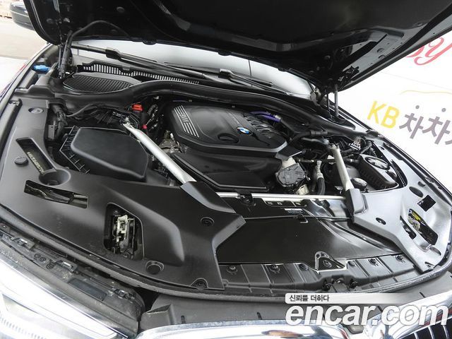 BMW 5-Series 2022 — photo 19