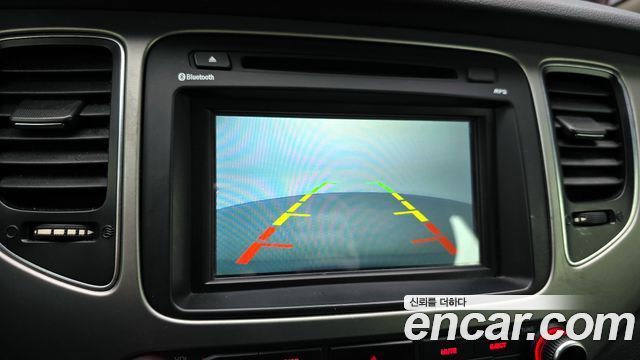 Kia Carens 2014 — photo 15