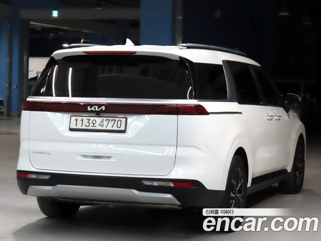 Kia Canival 2023 — photo 2