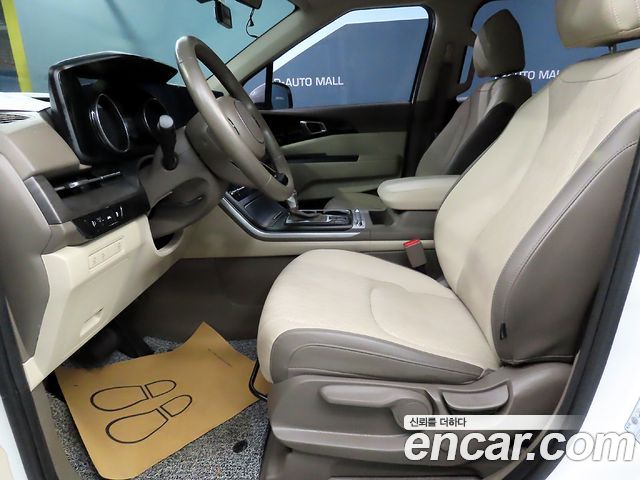 Kia Canival 2023 — photo 11