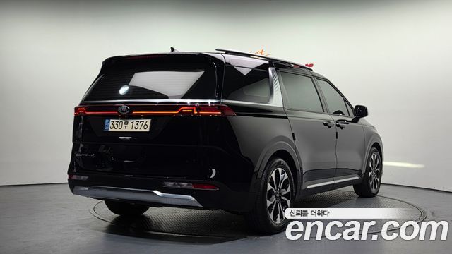 Kia Canival 2021 — photo 2