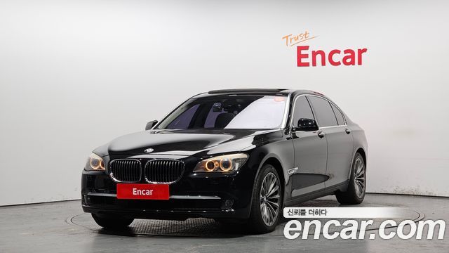 BMW 7-Series 2012 — photo 1