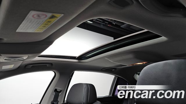 BMW 7-Series 2012 — photo 18