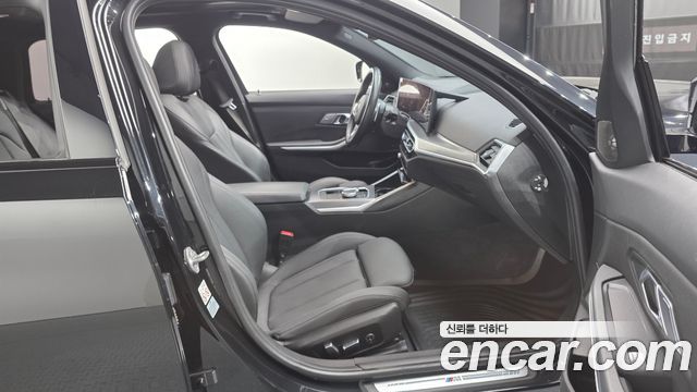 BMW 3-Series 2024 — photo 10