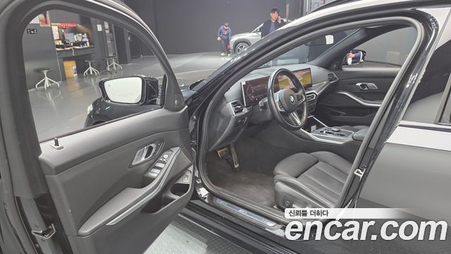 BMW 3-Series 2024 — photo 11