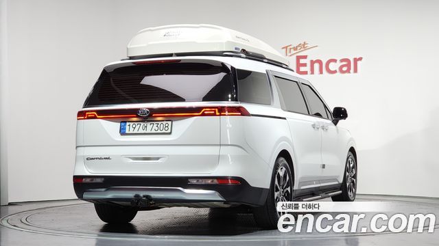 Kia Canival 2021 — photo 2