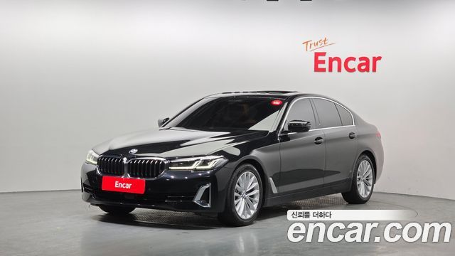 BMW 5-Series 2022 — photo 1