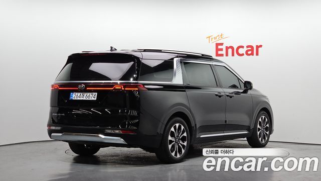 Kia Canival 2021 — photo 2
