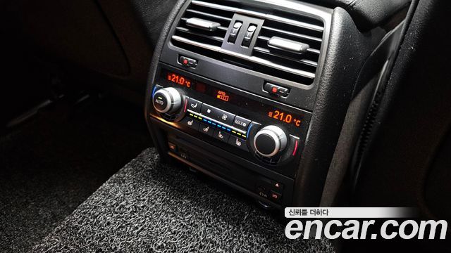 BMW 7-Series 2009 — photo 18