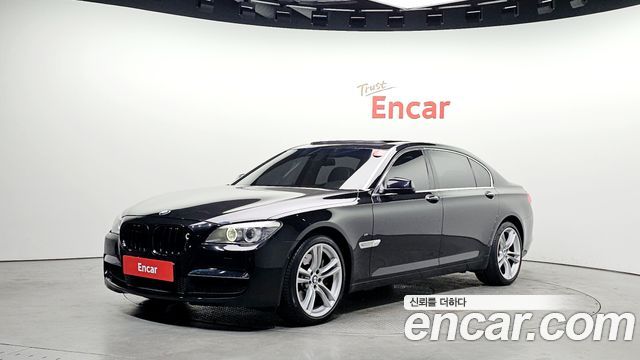 BMW 7-Series 2010 — photo 1