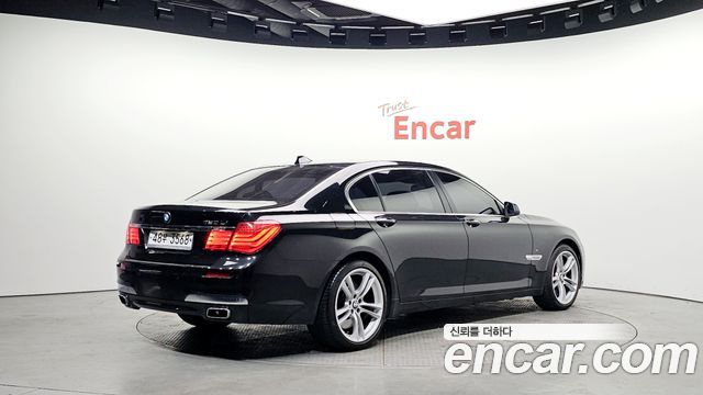 BMW 7-Series 2010 — photo 2