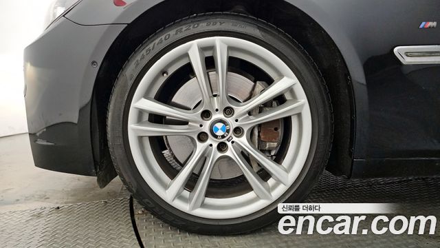 BMW 7-Series 2010 — photo 5