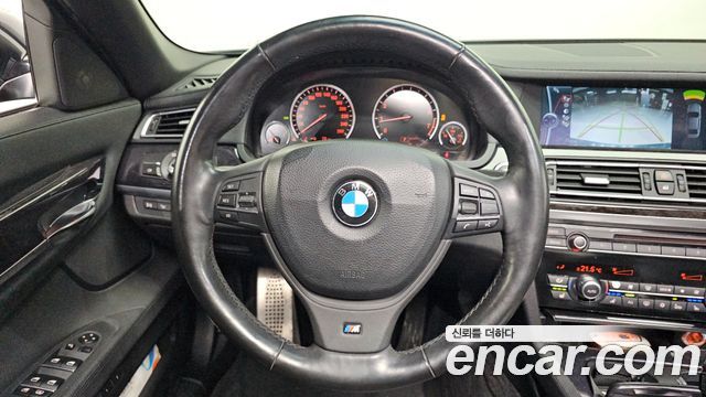 BMW 7-Series 2010 — photo 14