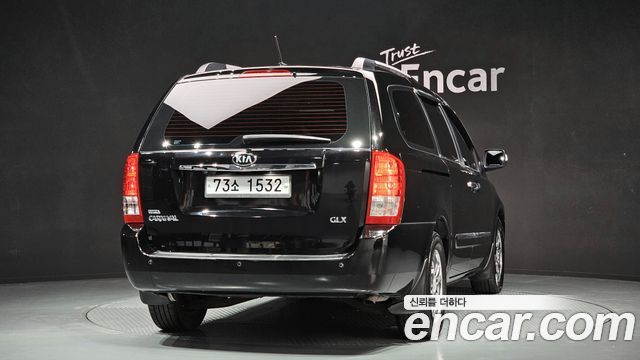 Kia Canival 2013 — photo 4