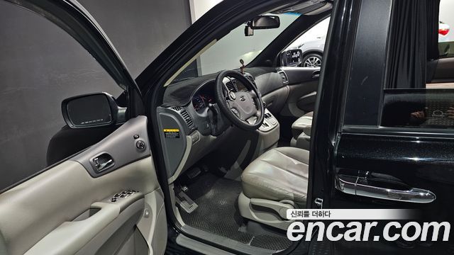 Kia Canival 2013 — photo 10