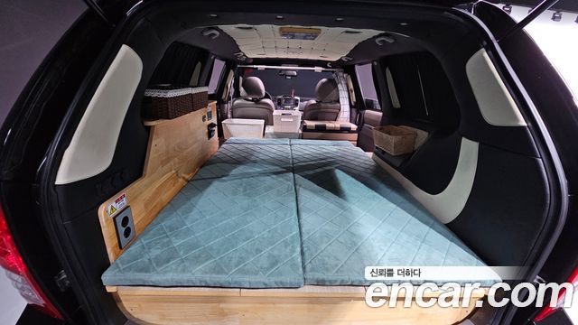 Kia Canival 2013 — photo 19