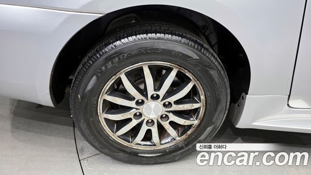 Kia Canival 2010 — photo 5