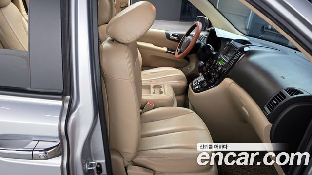 Kia Canival 2010 — photo 11
