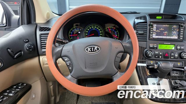 Kia Canival 2010 — photo 12
