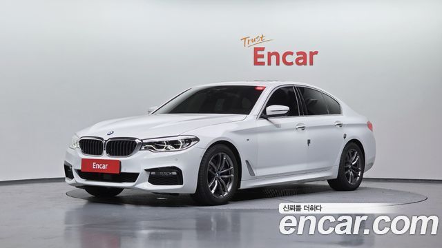 BMW 5-Series 2018 — photo 1
