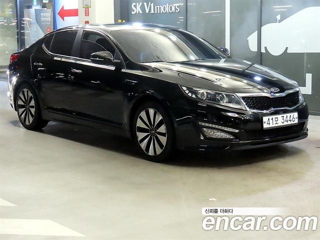 Kia K5 2011 — photo 1
