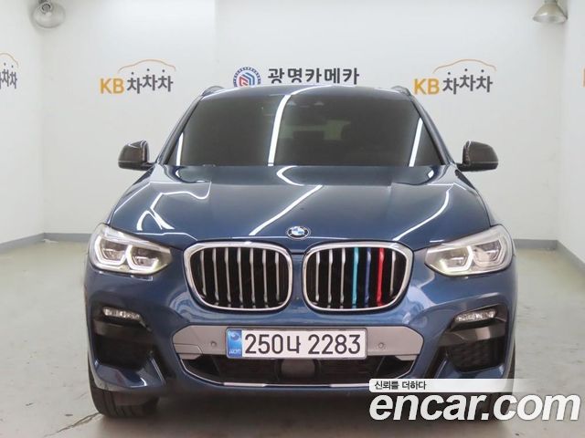 BMW X4 2021 — photo 1