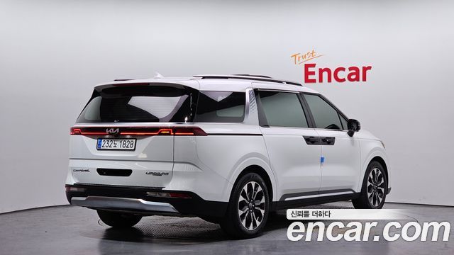 Kia Canival 2021 — photo 2