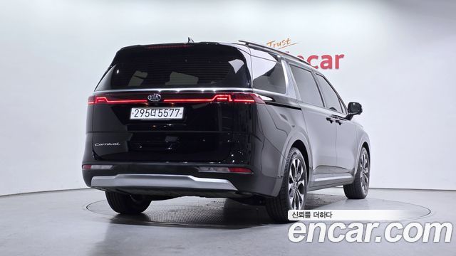 Kia Canival 2021 — photo 2