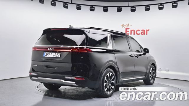 Kia Canival 2023 — photo 2