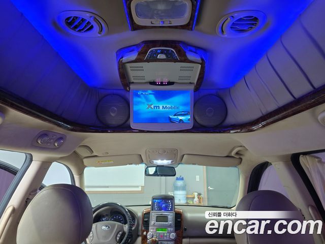 Kia Canival 2014 — photo 17