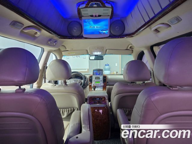 Kia Canival 2014 — photo 19
