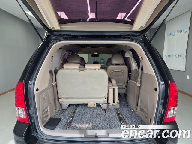 Kia Canival 2014 — photo 20